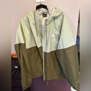 Very Nice The North Face rain jacket in 2 beautiful shades of green!  Size XL.